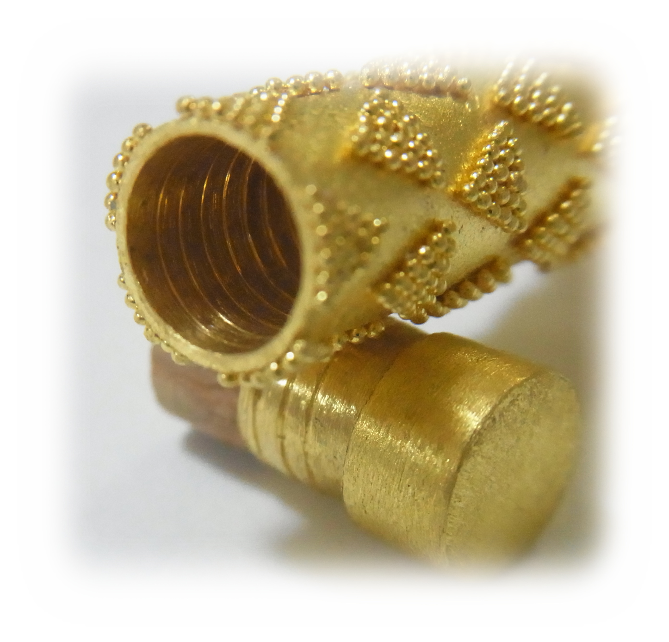 Cylindrical Gold Amulet with granulation(inside)
