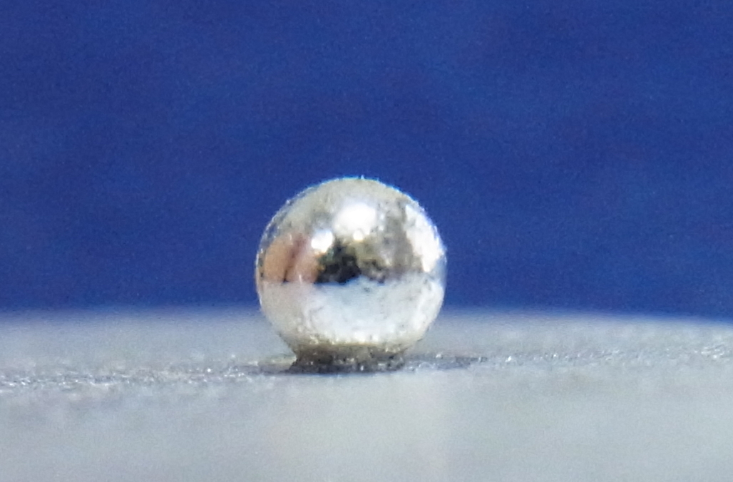 Silver granules joined to a silver plate (magnified view)